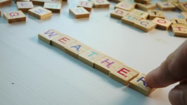 Close Person Writing Weather Wooden Tiles Letters White Background Flat — Stock video