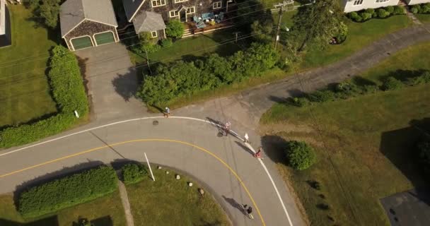 Aerial View Girls Longboarding Cycling Beach Road — Vídeos de Stock