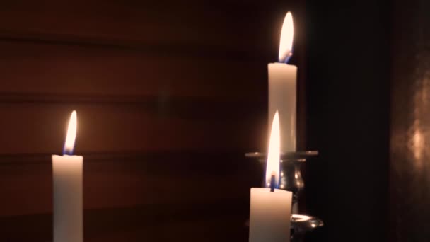 Mid Handheld Shot Few Candles Silver Candlestick Wooden Walls Mirror — Stock Video