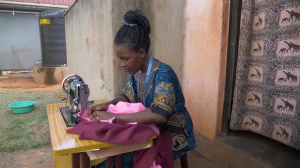 Side View African Lady Sewing Clothes Manual Tailoring Machine Her — Stock Video