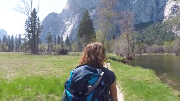 Young Woman Walking Yosemite Valley Merced River Travel Adventure Concept — Stock Video