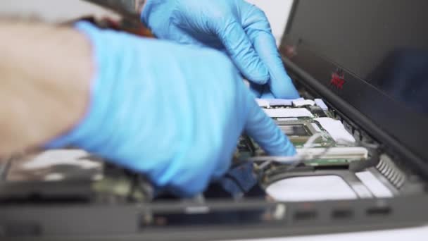 Static View Technician Worker Fixing Old Laptop Protective Gloves Installing — Stock Video