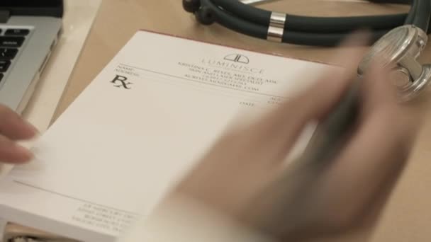 Close Doctor Hand Writing Prescription — Stock video