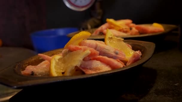 Handheld Close Shot Frozen Shrimps Dirty Silver Bucket Lemons Maint — Stock video