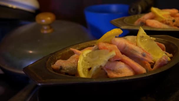 Handheld Close Shot Hand Putting Lemons Some Frozen Shrimps Which — Stock video