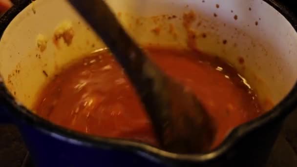 Close Handheld Shot Barbeque Cajun Sauce Being Stirred Ladle Blue — Stok Video