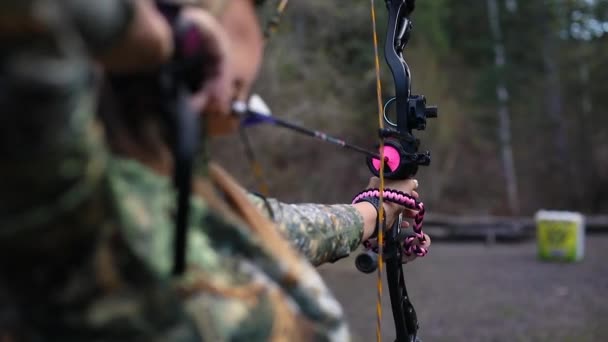 Girl Holding Bow Arrow Which Pulled Back Ready Fire Target — Stock Video