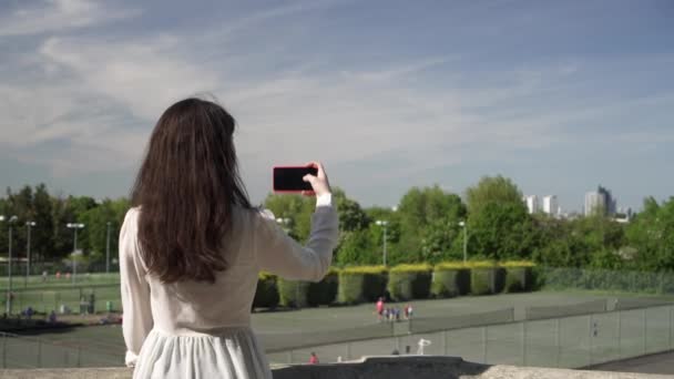 Pretty Italian Woman Tourist Taking Photograph Park Wimbledon London Happy — Stock Video