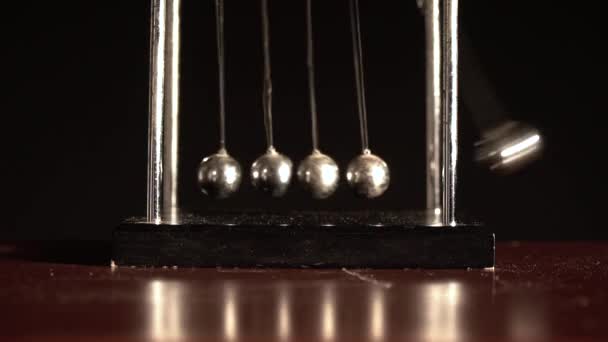 Newton Cradle Black Background Front View Close Shot — Stock Video