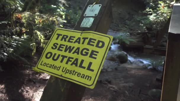 Sign Warning Treated Sewage Forest — Stock Video