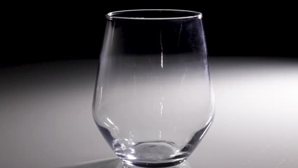 Water Being Poured Clear Glass Dark Background — Stock Video