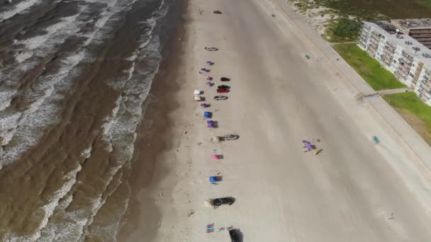 Angled View Ocean Beach Skyline Visible Descending Several Vehicles Tents — Stock Video