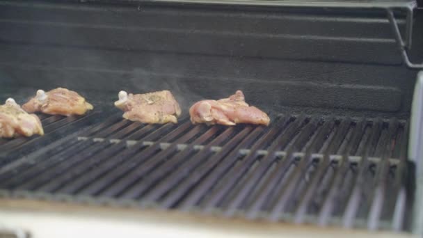 Man Hand Using Tongs Place Raw Chicken Barbecue — Stock Video