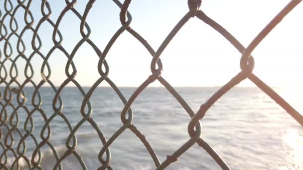 Pacific Ocean Chainlink Fence — Stock Video
