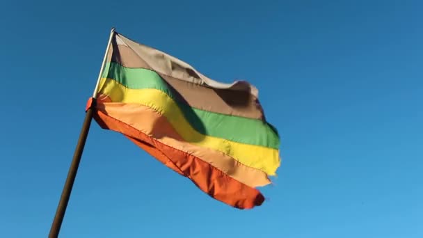 Wildly Waving Weathered Ragged Upside Rainbow Coloured Lgbt Flag Contrasted — Stock Video