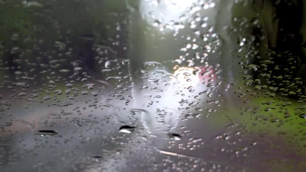 Defocused Cars Drive Rural Road Seen Rain Covered Windshield — Stock Video