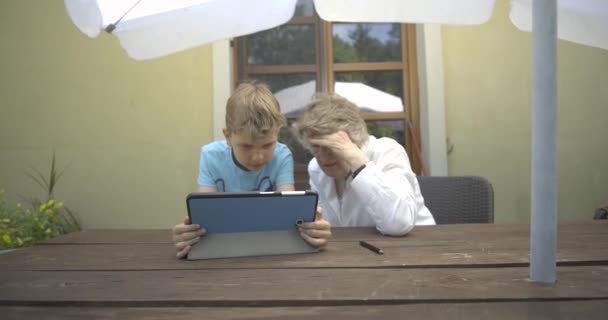 Grandmother Grandson Using Tablet — Stock Video