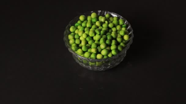 Bowl Full Green Peas Placed Black Background — Stock Video