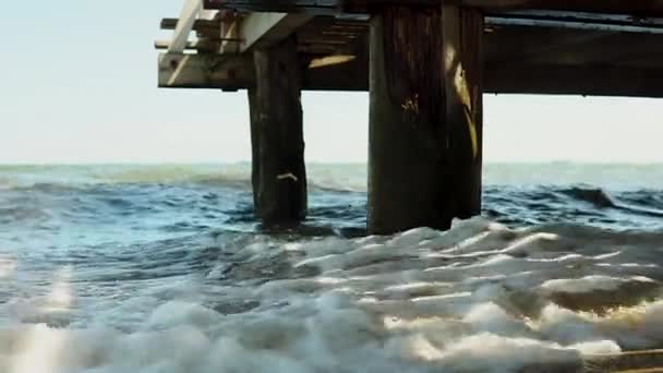 Turbulent Waves Sea Reflect Pier Water Hits Wooden Piles Driven — Stock Video