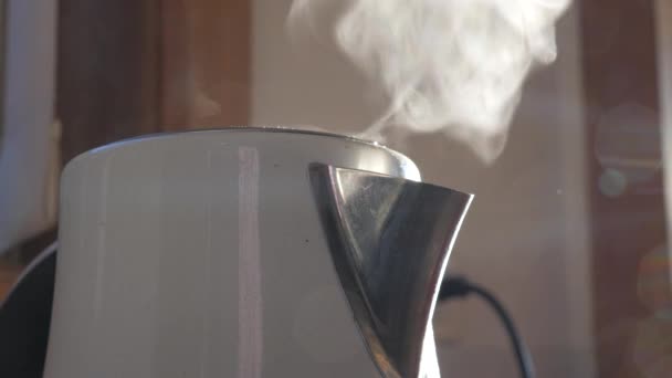 Boiling Water Steam Comes Out White Modern Kettle — Stock Video