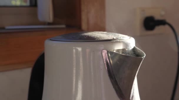Pan Boiling Water Steam Comes Out White Modern Kettle — Stock Video