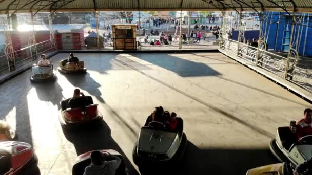 Children Teenagers Playing Electric Bumper Cars Theme Amusement Park Sunny — Stock Video