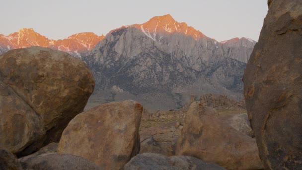 Sunrise Slightly Snowy Mount Whitney Alabama Hills Boulders Foreground — Stock Video