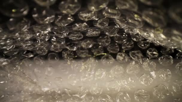 Pulling Out Bubble Wrap Bag Top Bag Moves Slightly Focused — Stock Video