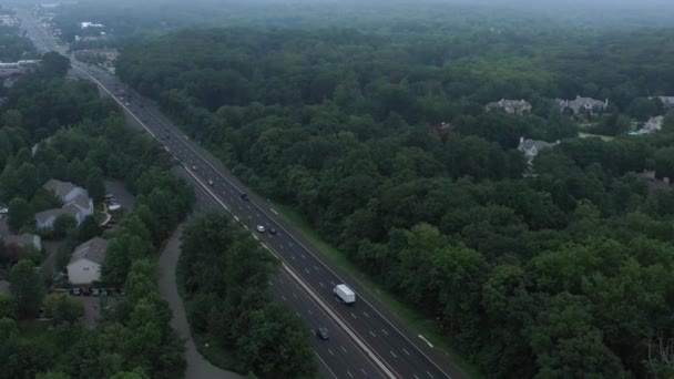 Aerial Footage Flies Suburban Highway Foggy Morning Showing Mansions Other — Stock Video