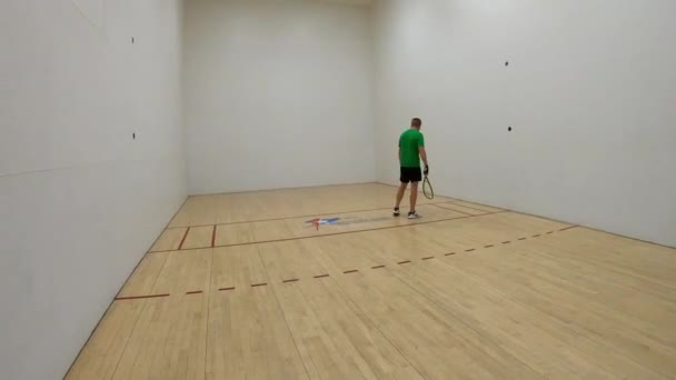 Fpv Man Cut Throat Racquetball Player Drive Serves Serve May — Stock Video