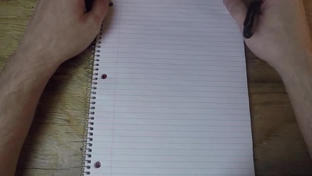 Persona Che Guarda Taccuino Carta Con Una Penna Mano Senza — Video Stock