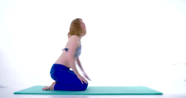 Young Caucasian Woman Changes Cobra Easy Yoga Pose Mattress Studio — Stock Video