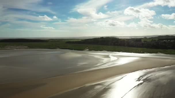 Aerial View Beach Low Tide Sun Shimmering Wet Sand Bright — Stock Video