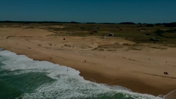Rocha Coastal Beach Few People Moving — Stock Video