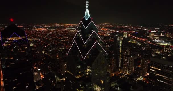 Rising Aerial Night Reveals Dramatic Skyscraper Tower Darkness City Lights — Stock Video