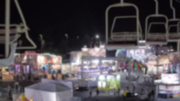Blurry Bokeh Empty Gondolas State Fair Carnival Amusement Park Night — Stock Video