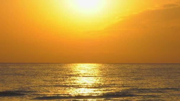 Golden Sea Reflecting Sun Rising Orange Sky — Stock Video