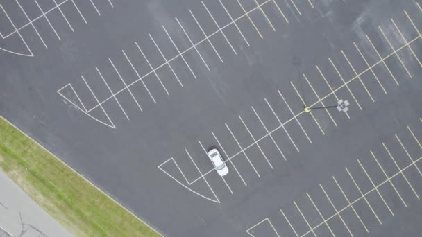 Aerial Drone Bird Eye Shot White Car Parked Empty Parking — Stock Video