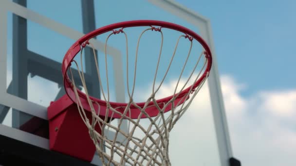 Man Dunking New Basketball Net Holding Ball Rim Makes Dunk — Stock Video