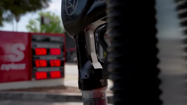 Gas Pump Handle Gas Price Sign Background Cinematic Parallax Gas — Stock Video