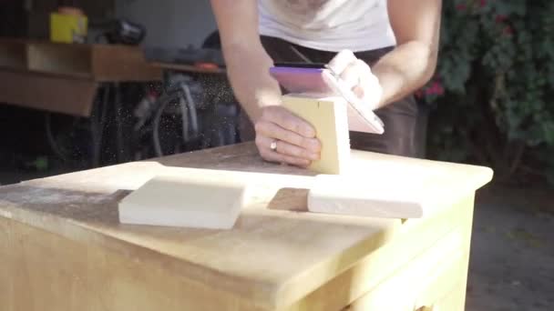 Man Hand Sanding Wooden Block — Stock Video