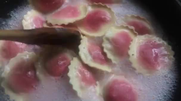 Colourful Fiorelli Beetroot Goat Cheese Pasta Stirred Wooden Spoon Bubbling — Stock Video