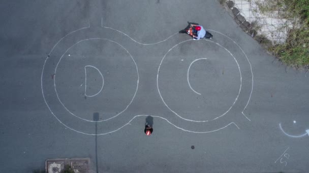 Motorcycle Rider Practices Figure Eight Test Track Top Drone View — Stock Video