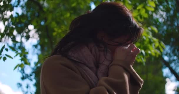 Shot Woman Crying Hiding Face Hands While Visiting Park Surrounded — Stock Video