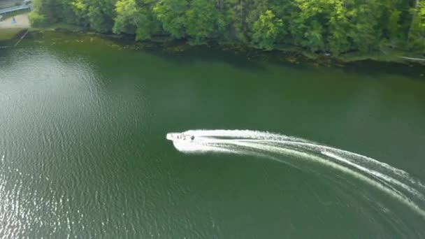 Aerial Drone Bird Eye View Water Skiier Skiing Speedboat Sunset — Stock video