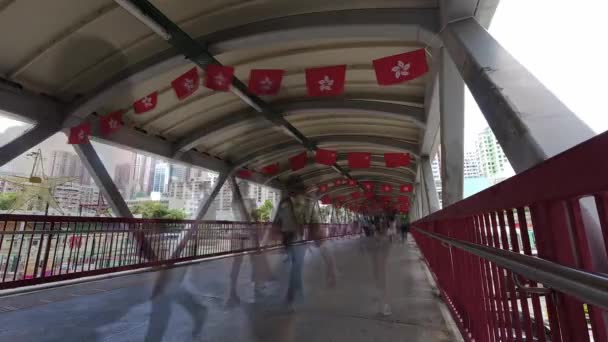 Busy Pedestrian Bridge Decorated Hong Kong China Flags Time Lapse — Stock Video