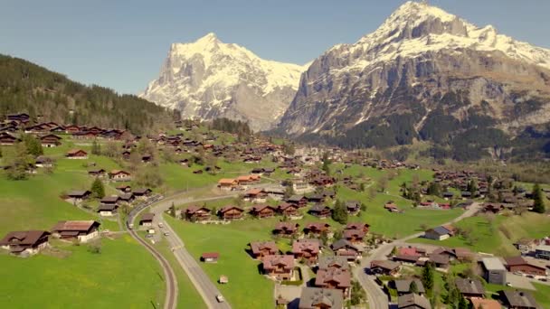 Aerial Drone Footage Pushing Out Views Mountain Train Leaving Grindelwald — Stock Video