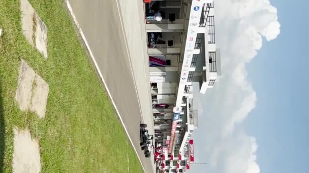 Formula One Motor Racing Cars Warmup Lap Vertical — Stock Video