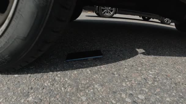 Smart Phone Street Destroyed Driven Vehicle Tire — Stock Video