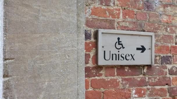 Unisex Disables Toilets Restroom Sign Brick Wall — Stock Video